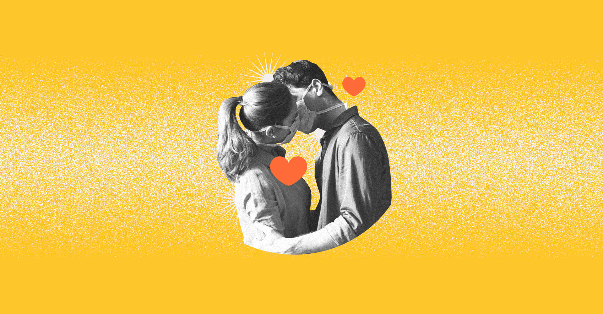 Couple kissing with masks on