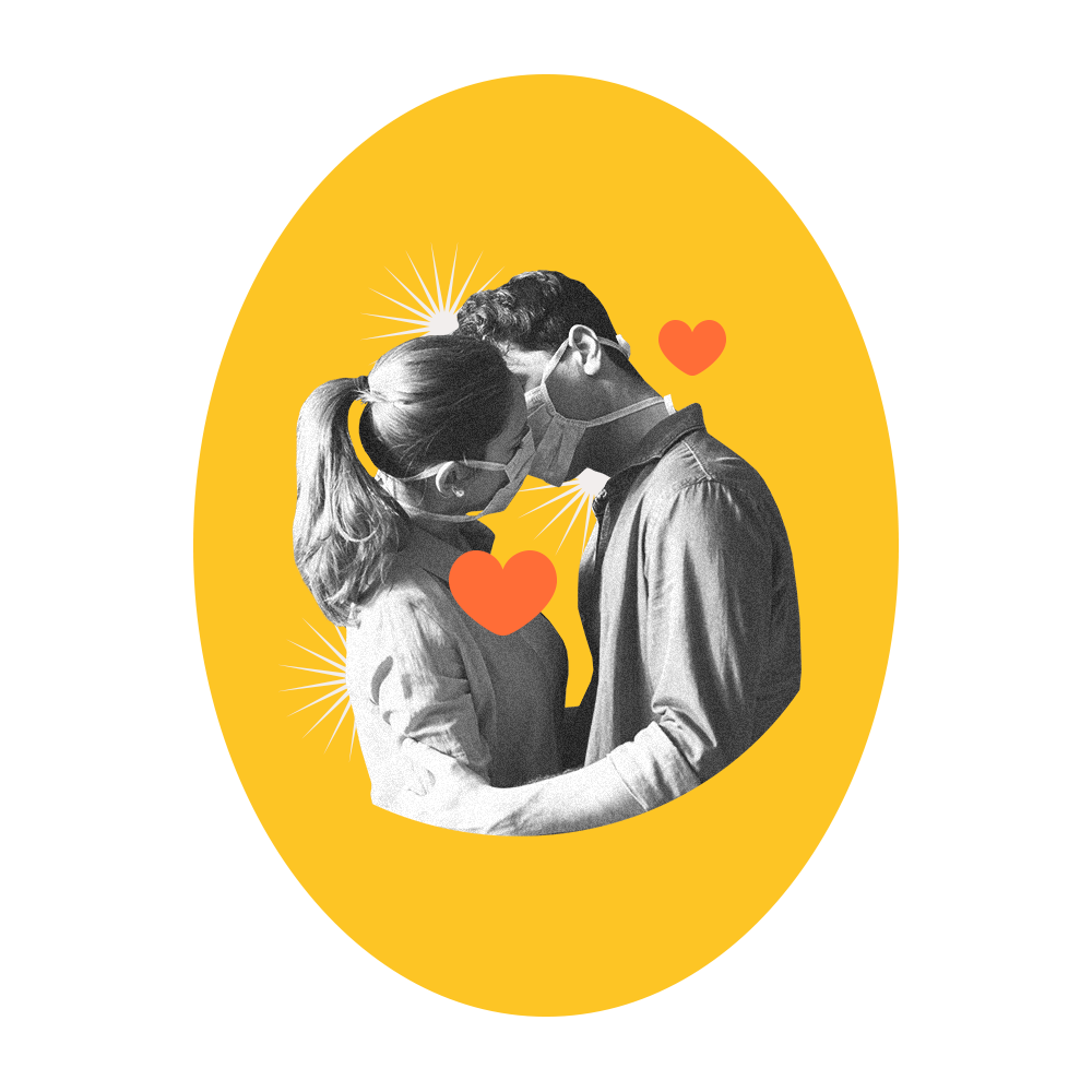 couple kissing with surgical masks on